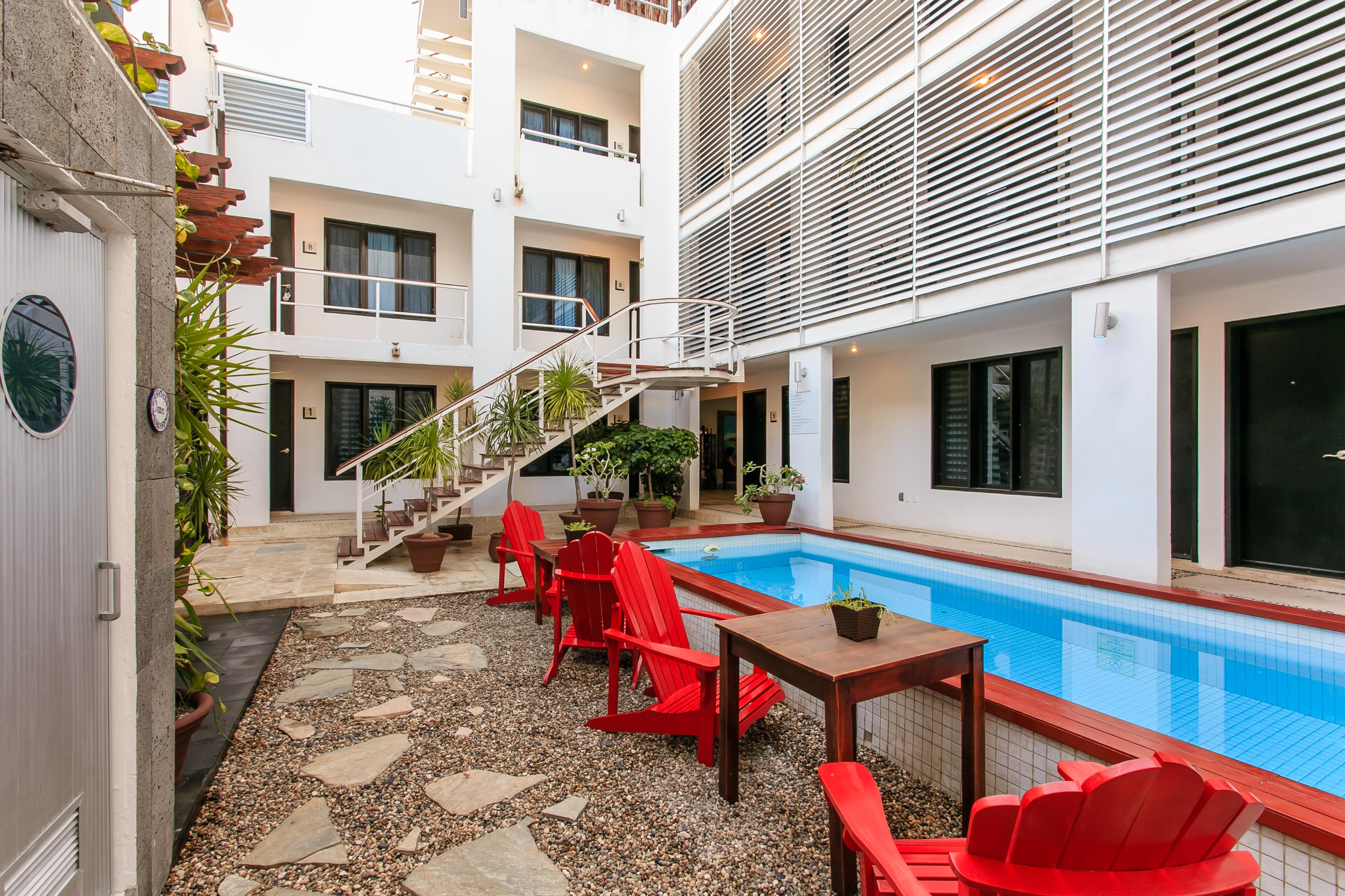 Casa Ticul Hotel Boutique - 5Th Ave (Adults Only) Плая дел Кармен Екстериор снимка The Hotel's courtyard